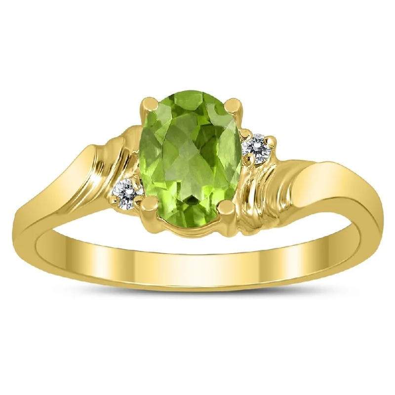 wedding rings with multiple stones -7X5MM Peridot and Diamond Wave Ring in 10K Yellow Gold