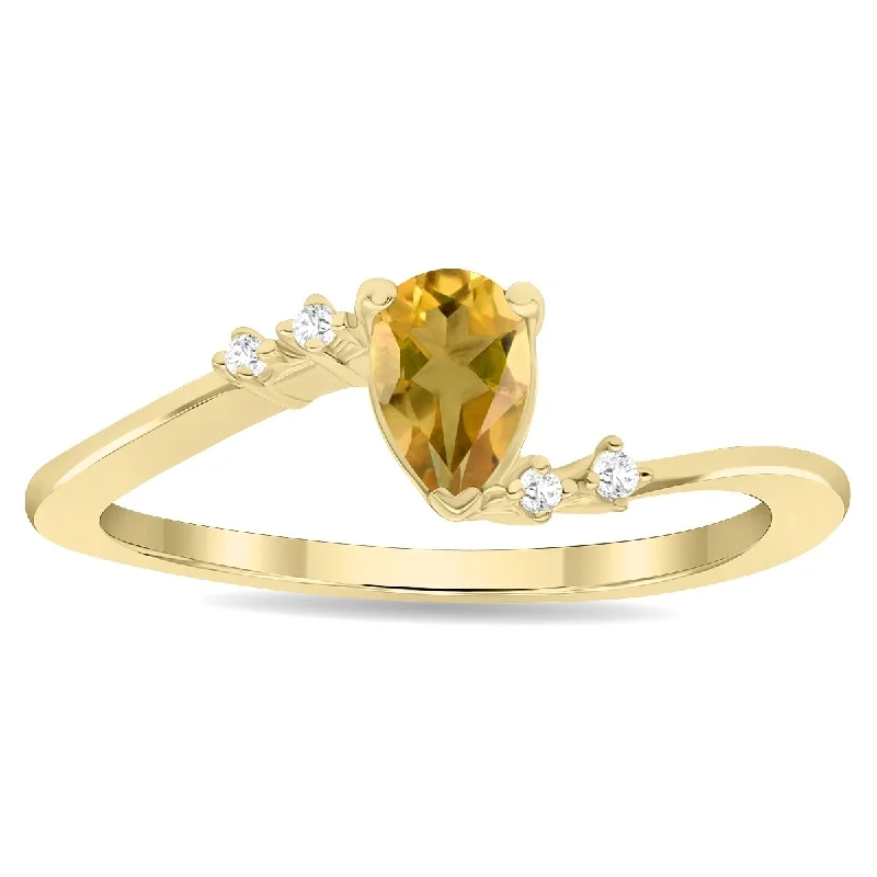 luxury fashion rings for women -Women's Pear Shaped Citrine and Diamond Wave Ring in 10K Yellow Gold