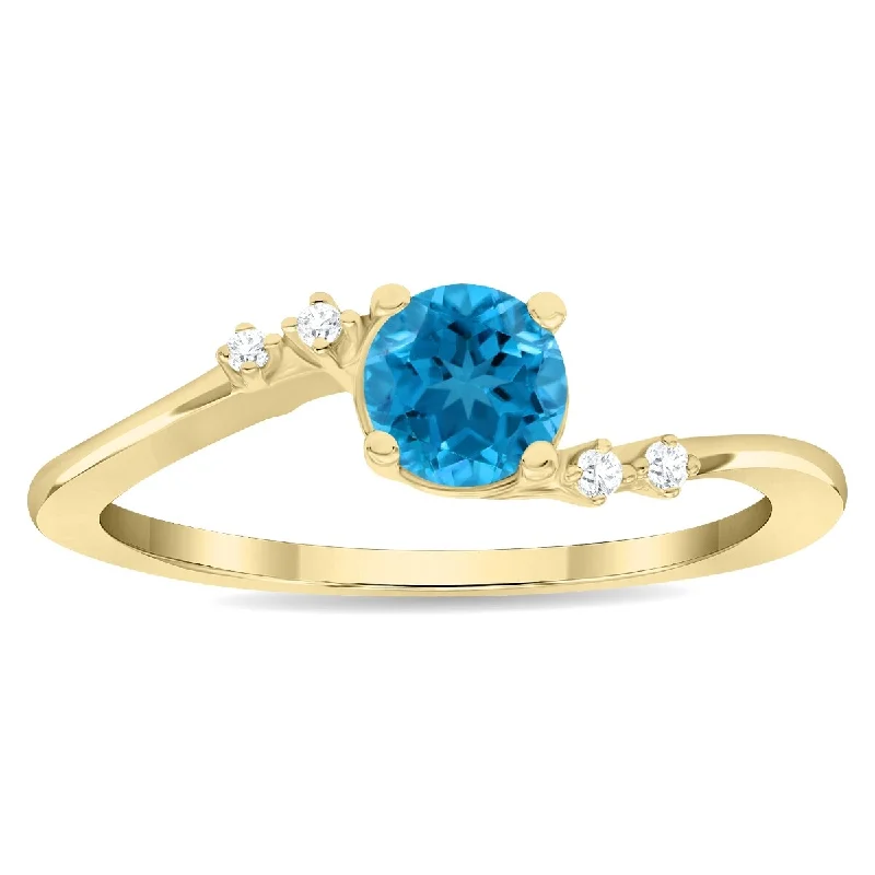 oval rings for women -Women's Round Shaped Blue Topaz and Diamond Tierra Ring in 10K Yellow Gold