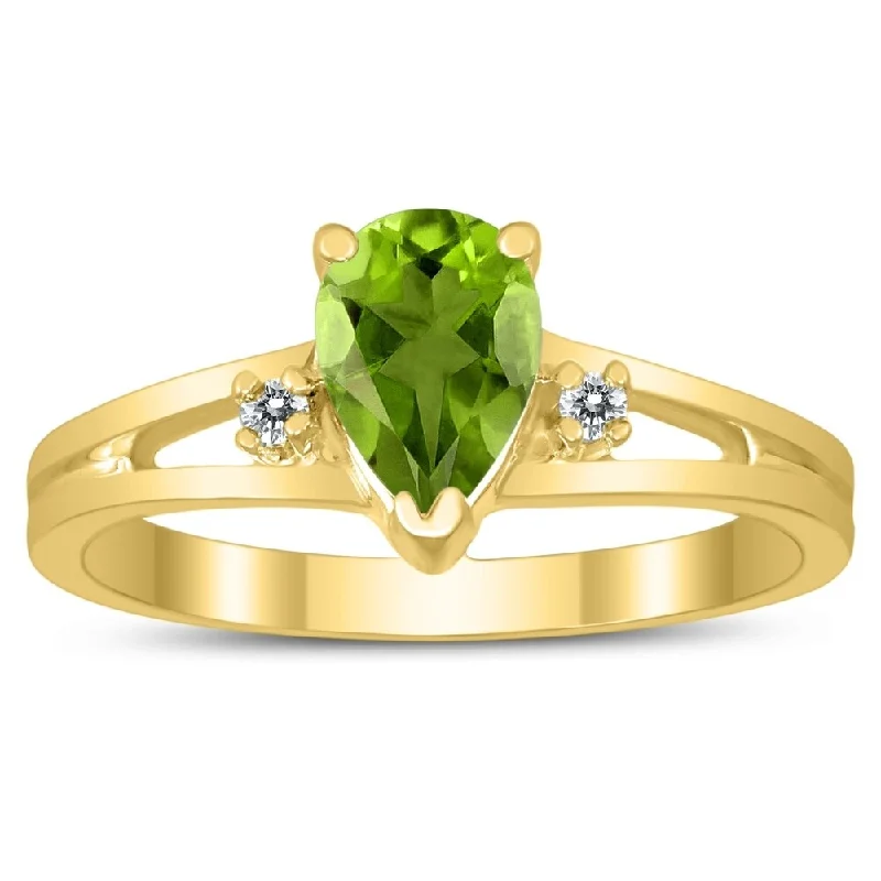 anniversary rings with gemstones -7X5MM Peridot and Diamond Pear Shaped Open Three Stone Ring in 10K Yellow Gold