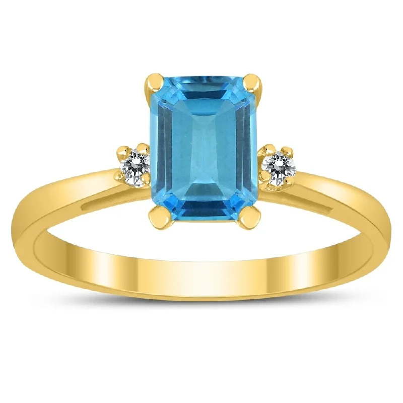 promise rings with birthstones -Emerald Cut 7X5MM Blue Topaz and Diamond Three Stone Ring in 10K Yellow Gold