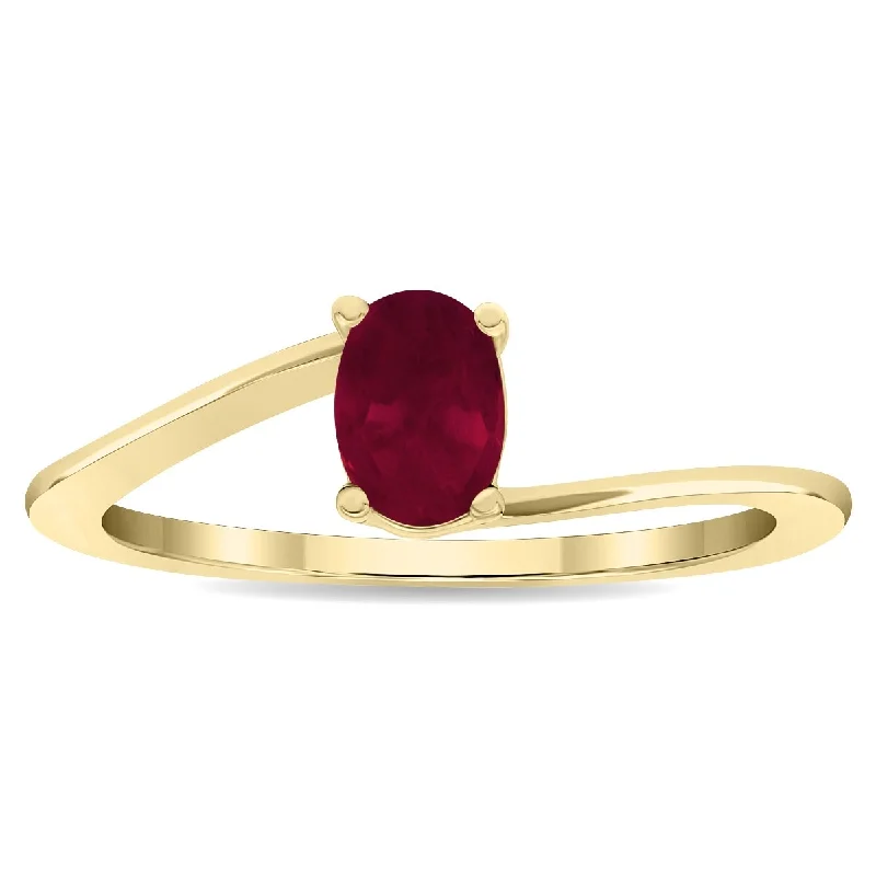 wedding rings for women -Women's Solitaire Oval Shaped Ruby Wave Ring in 10K Yellow Gold