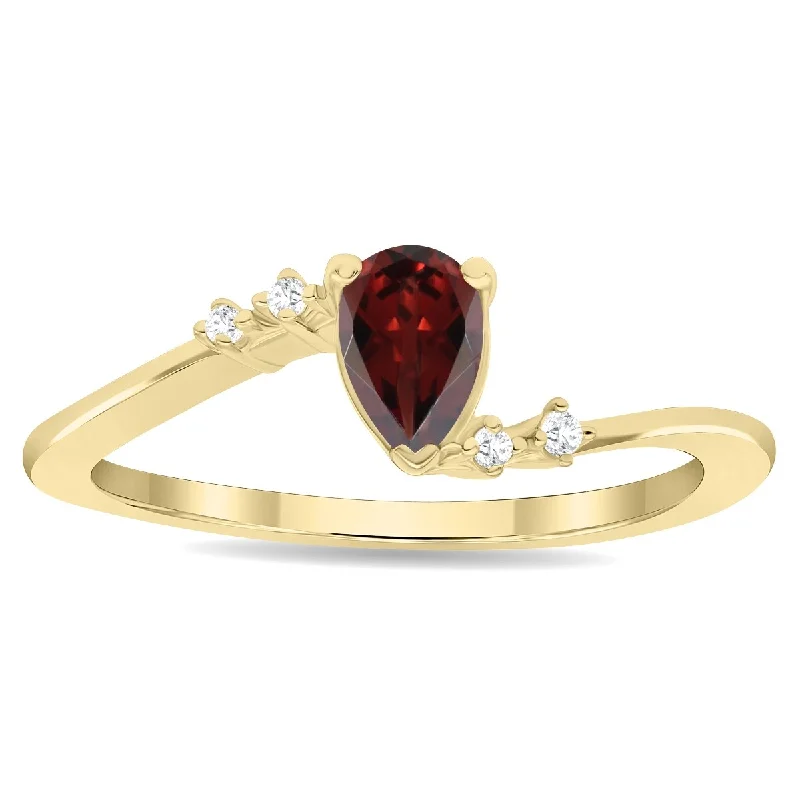 fashion rings for women -Women's Pear Shaped Garnet and Diamond Wave Ring in 10K Yellow Gold