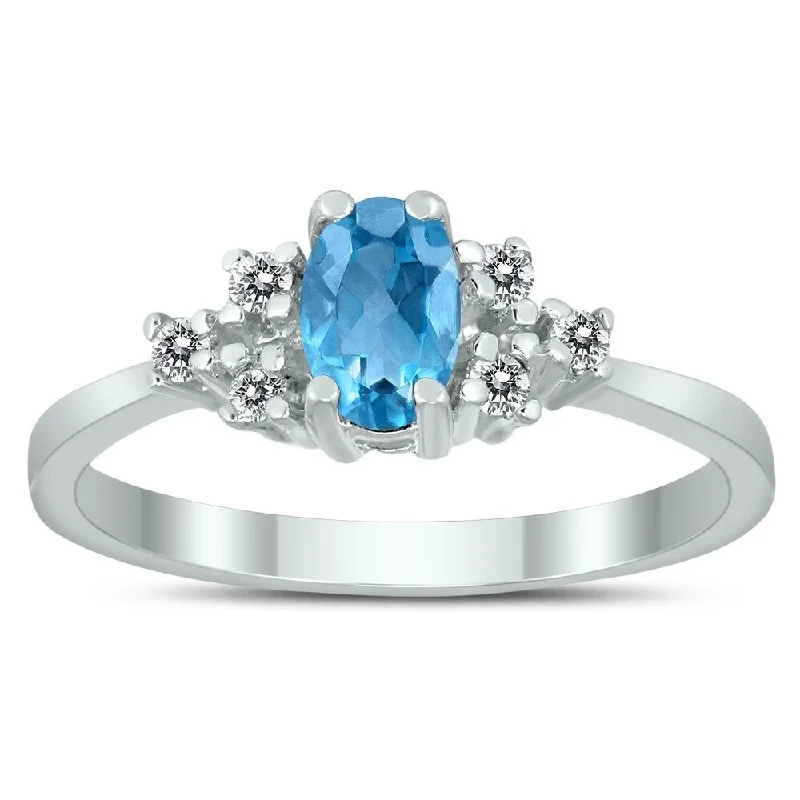 wedding rings with multiple stones -6X4MM Blue Topaz and Diamond Regal Ring in 10K White Gold