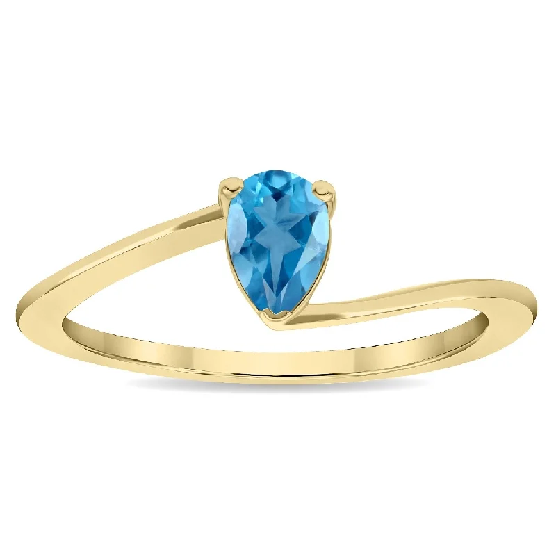 mixed metal rings for women -Women's Solitaire Pear Shaped Blue Topaz Wave Ring in 10K Yellow Gold